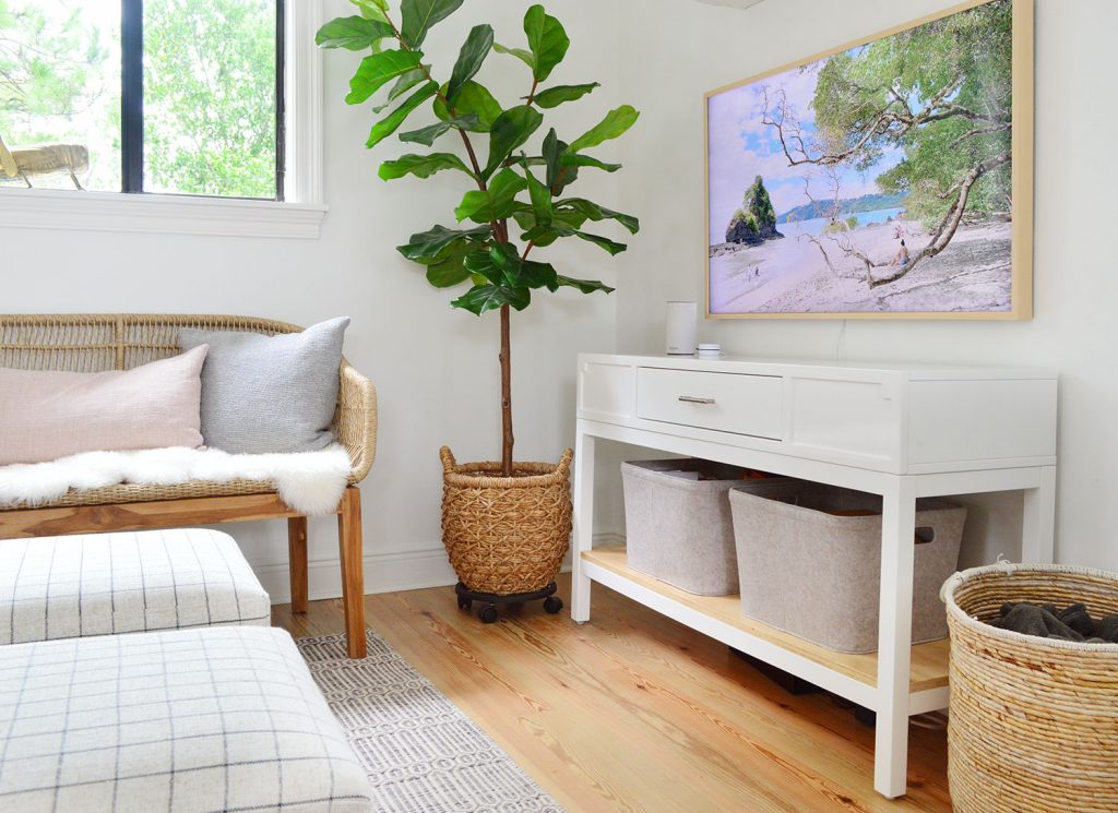 florida-living-room-tv-detail-1024x745-1 White Media Console With Frame TV And Woven Accessories
