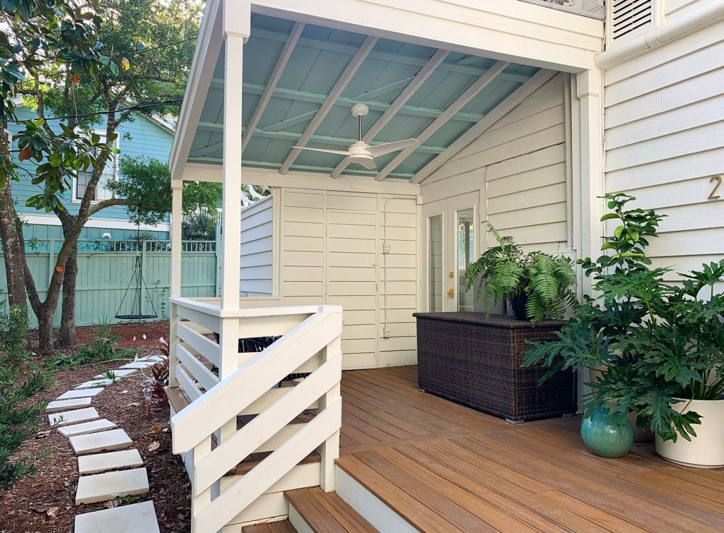 front-porch-fall-covered-porch-with-swing-1024x755-1 Covered Porch With Painted Blue Ceiling And White Ceiling Fan