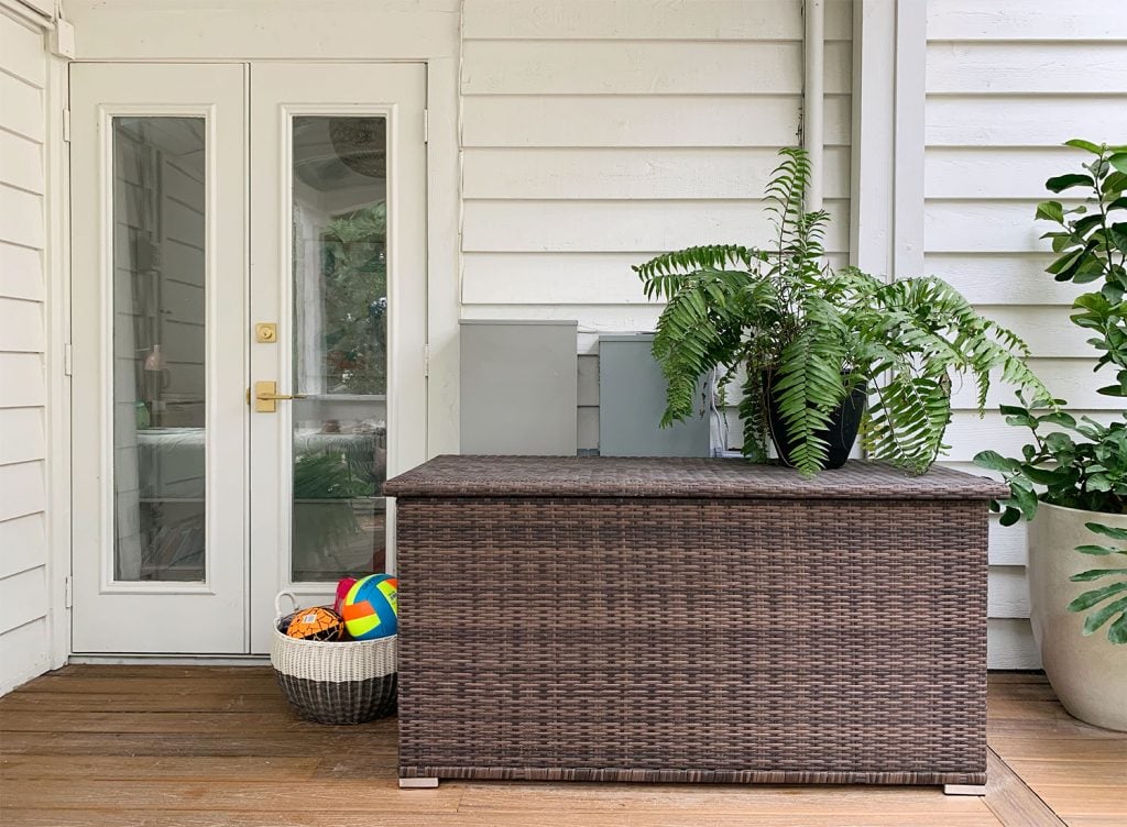 front-porch-fall-storage-bin-1024x752-1 Large Woven Storage Bin On Porch With Fern On Top