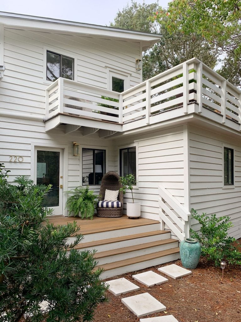 front-porch-fall-vertical-angle-768x1024-1 Two Levels Of Porches On White House With Horizontal Railings