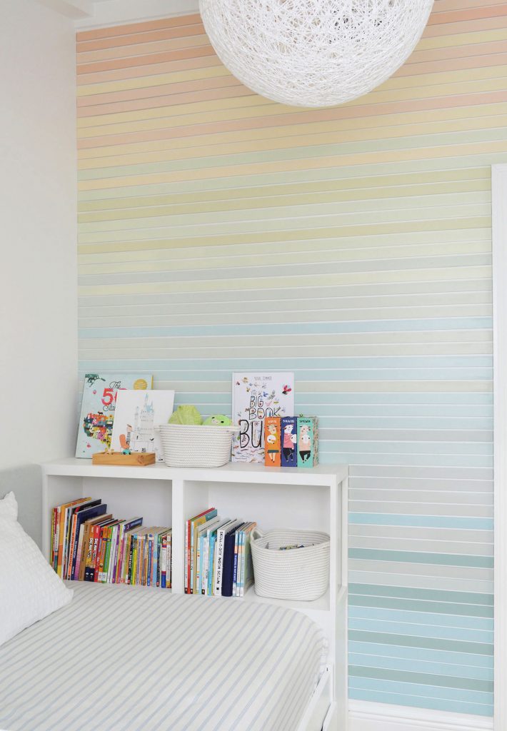 gradient-stripe-wall-full-angle-710x1024-1 Full View From Ceiling To Floor Of Rainbow Gradient Striped Wall Treatment In Boys Room