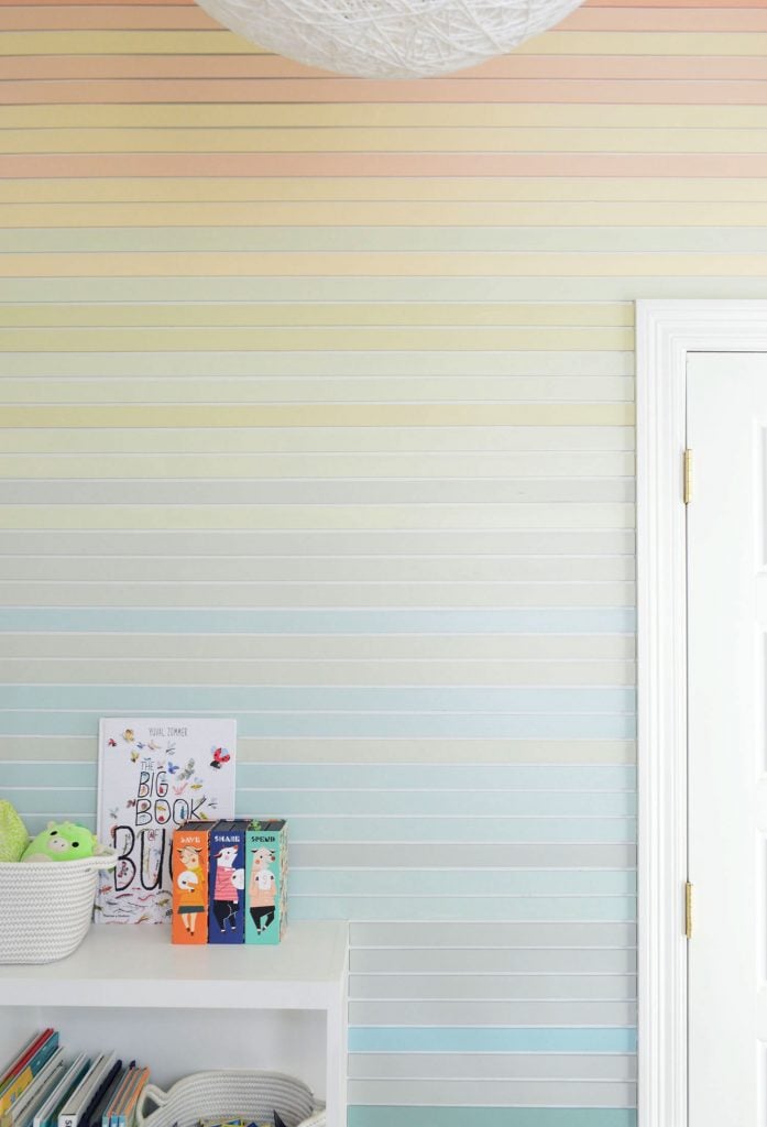 gradient-stripe-wall-straight-all-stripes-697x1024-1 Straight On View Of Striped Wall Treatment Going From Orange At Top To Blue At Bottom