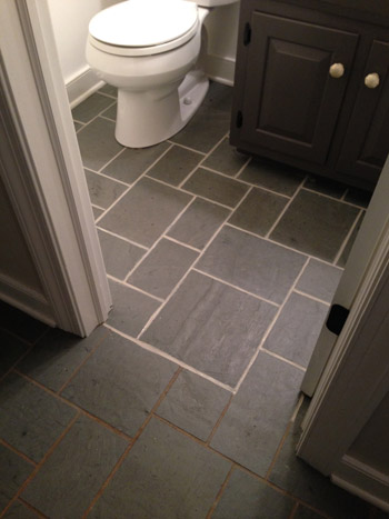 grout3 before and after difference between dirty grout line and clean grout line during PolyBlend Grout Renew DIY project