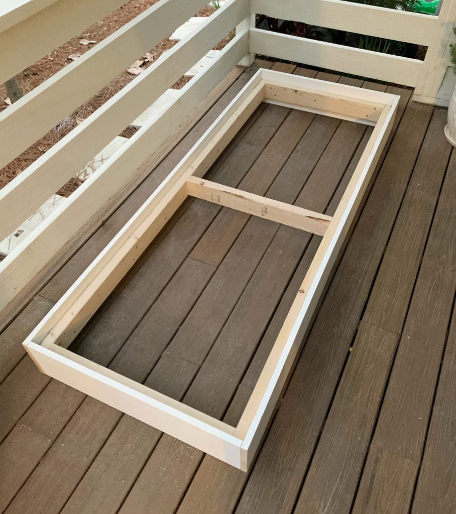 hanging-daybed-frame-constructed-908x1024-1 Fully constructed 2x4 platform frame with white 1x8 around outside