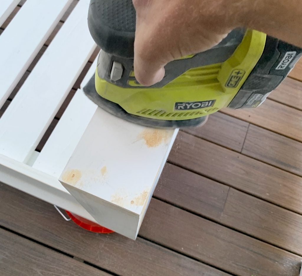 hanging-daybed-sanding-nail-holes-1024x937-1 Sanding wood filler on daybed with ryobi palm sander