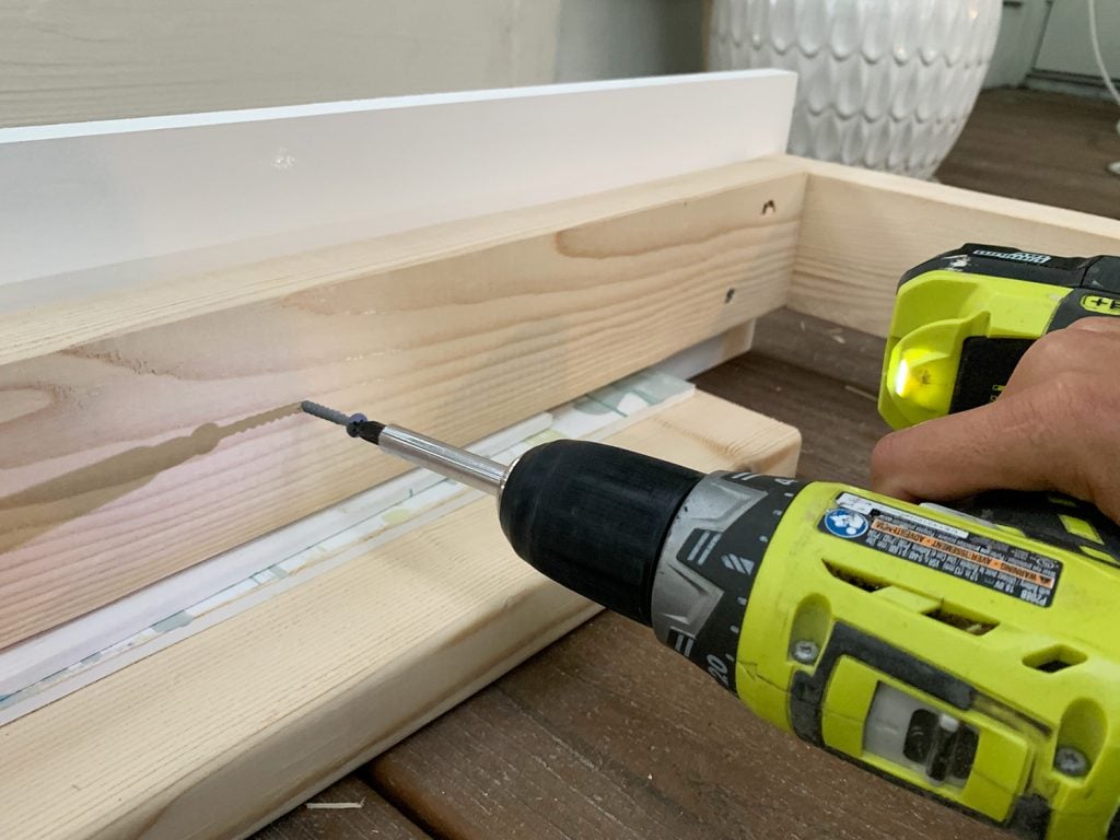 hanging-daybed-screwing-frame-to-side-1024x768-1 Screwing 2x4 wood frame to white 1x8 board