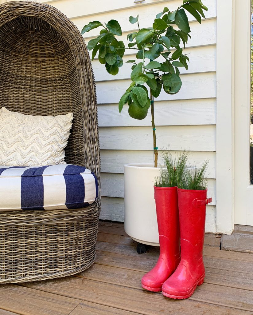 holiday-decor-2020-boots-with-fir-824x1024-1 Red Boots With Holiday Greenery On Front Porch