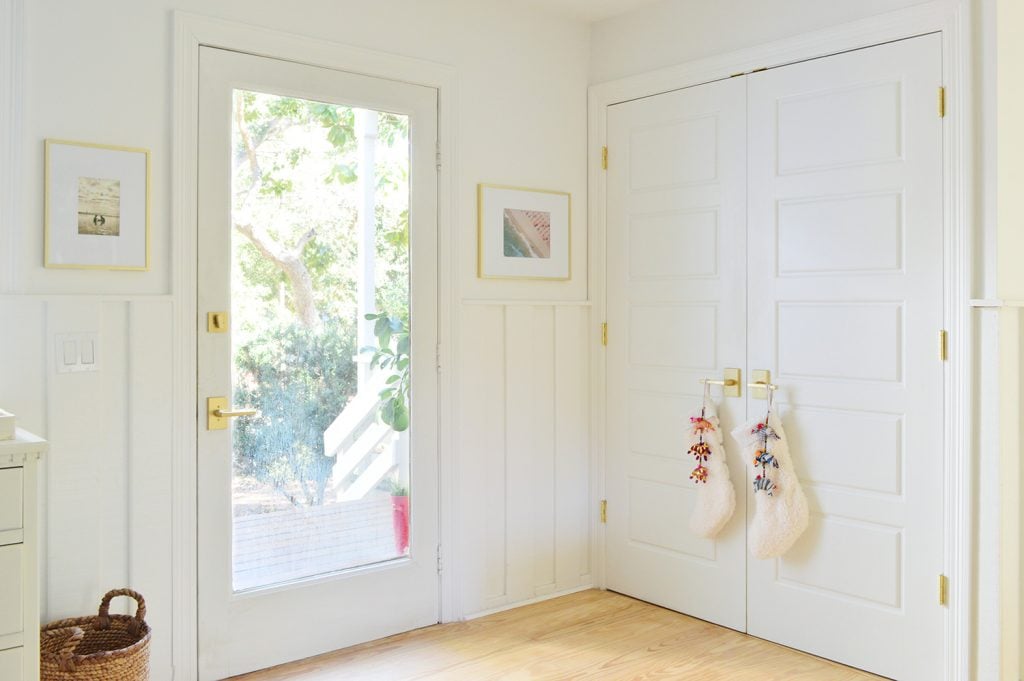 holiday-decor-2020-front-door-stockings-1024x681-1 Front Door Next To Laundry Closet With Stockings On Handle