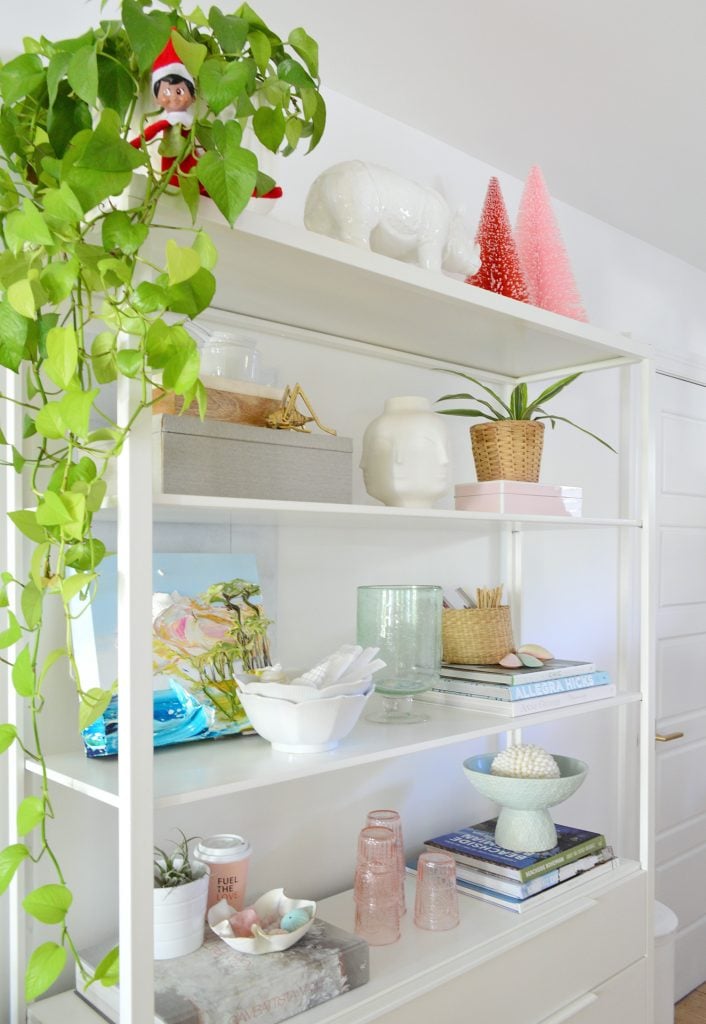 holiday-decor-2020-kitchen-elf-on-shelf-706x1024-1 White Metal Kitchen Shelves With Plants Bottlebrush Trees and Elf On Shelf