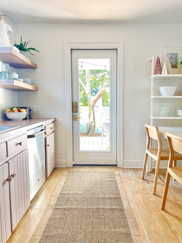 holiday-house-door-vertical-shot-768x1024-1 Same view of kitchen with new door added where window used to be