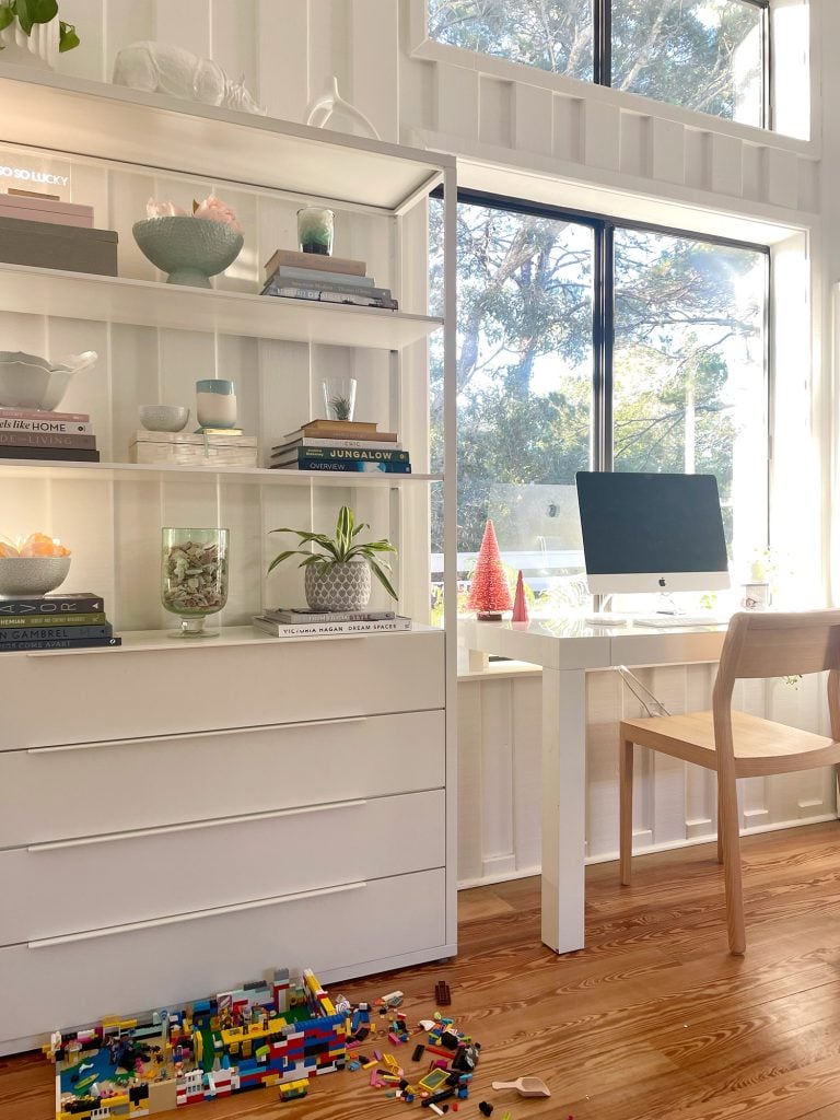 holiday-house-even-wider-desk-with-legos-768x1024-1 Pink bottlebrush trees on desk in upstairs office