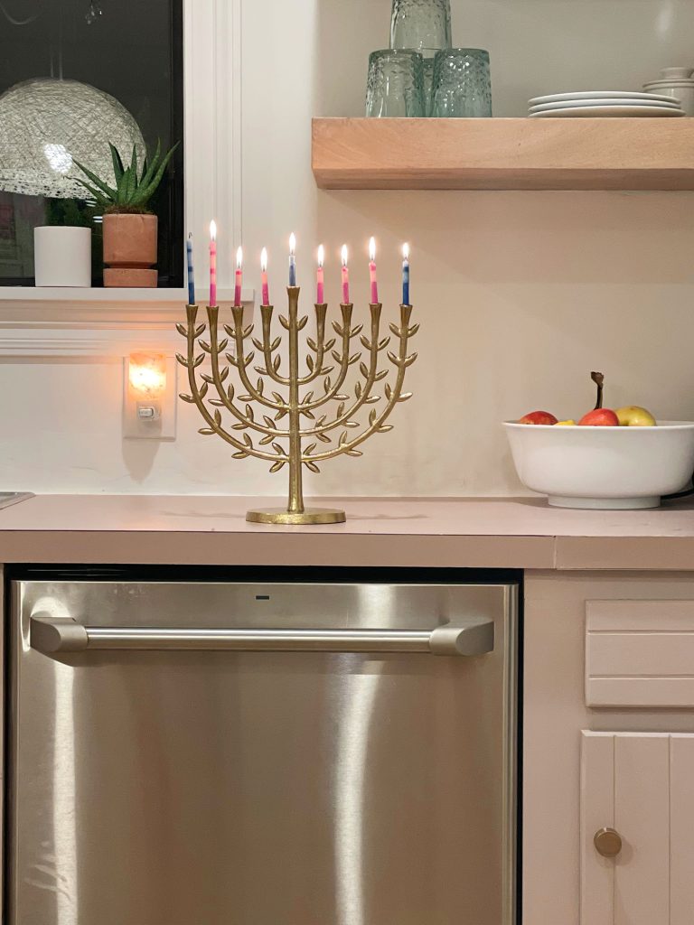 holiday-house-gold-menorah-768x1024-1 Gold leafy menorah on kitchen table