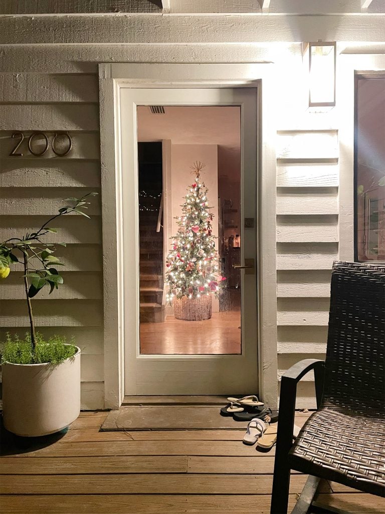 holiday-house-tree-through-door-768x1024-1 View of Christmas Tree in kitchen through front door at night