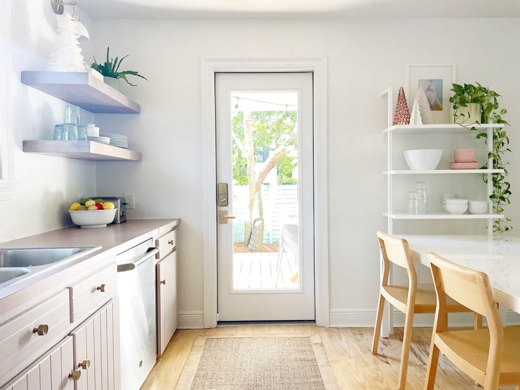holiday-house-wide-door-shot-horizontal1-1024x768-1 white kitchen with door out to patio