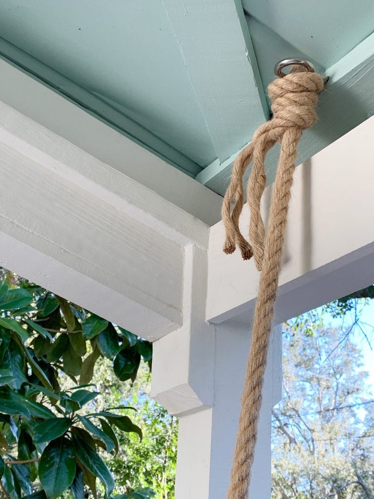 how-to-hang-daybed-knot-detail-768x1024-1 Rope knotted around screw eye hook in ceiling of covered porch
