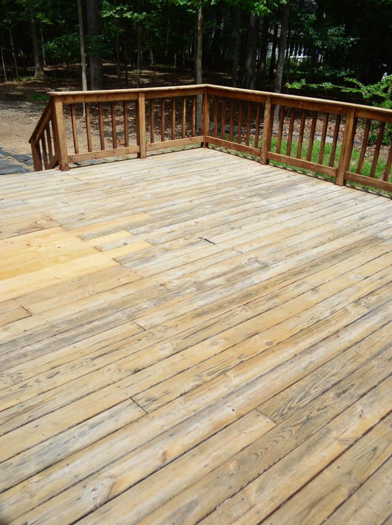 how-to-strip-a-deck-after-765x1024-1 After photo of deck bleached with fresh wood after stripping process