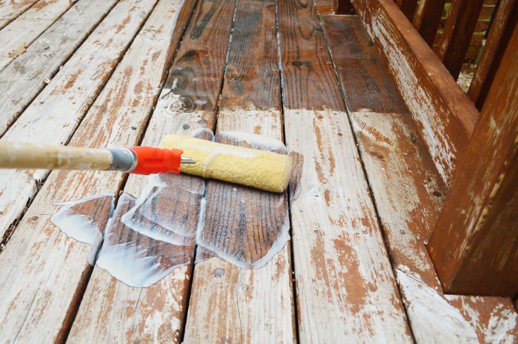 how-to-strip-a-deck-roller-applying-stripper-1024x681-1 Rolling deck finish stripper onto wood deck