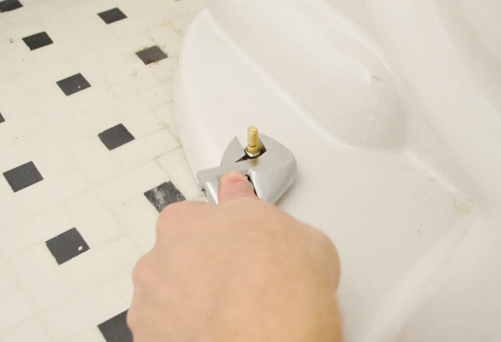 install-a-toilet-tightening-bowl-bolts-1024x700-1 Hand Tightening Bolt For Toilet Bowl Installation