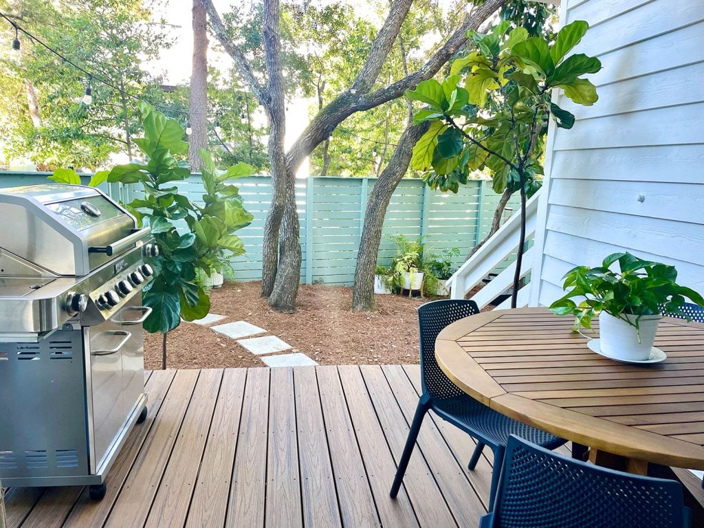 kitchen-porch-after-horiztonal-looking-out-1024x768-1 View from cover patio with grill and table overlooking greenery in yard