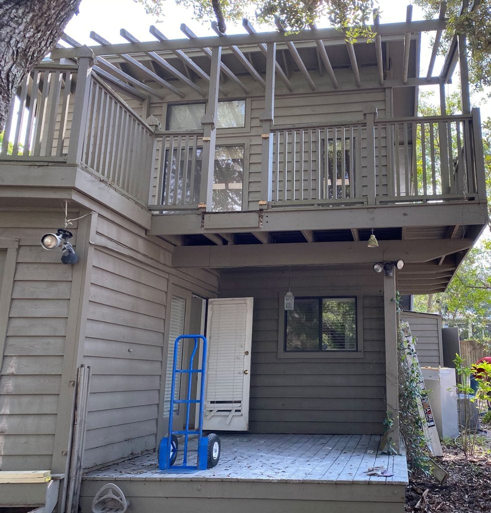 kitchen-porch-before-closer-shot-981x1024-1 Before photo of brown painted house with dirty side yard