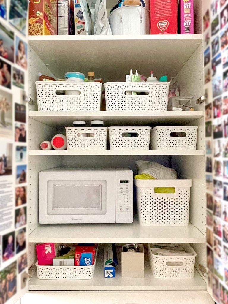 kitchen-update-pantry-open-microwave-baskets-768x1024-1 Close Up Shot Of Pantry Shelves With Baskets And Microwave