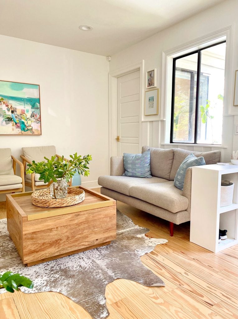 kitchen-update-sitting-area-vertical-corner-shot-764x1024-1 Kitchen Sitting Area With Gray Loveseat Wood Coffee Table Cowhide Rug And Storage Cubby