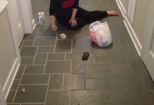 me-painting-grout Application of PolyBlend Grout Renew from Home Depot to discolored tile grout using a small paintbrush