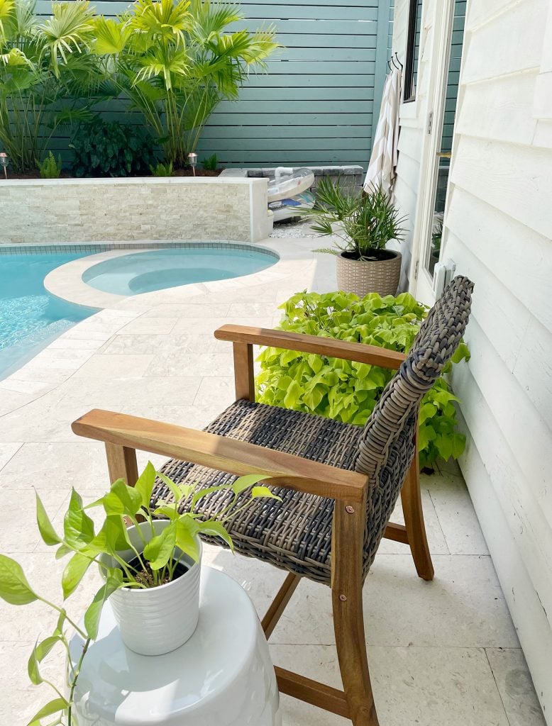 pool-post-after-hot-tub-fence-color-together-778x1024-1 View of pool patio material showing tone-on-tone color scheme of tile selections