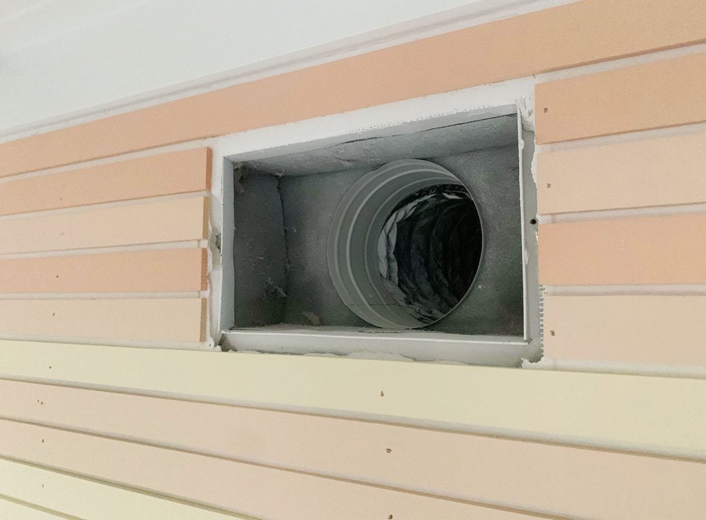 rainbow-stripe-wall-air-duct-1024x754-1 Wall Vent Cover Removed To Show How Wood Was Cut Around Obstruction
