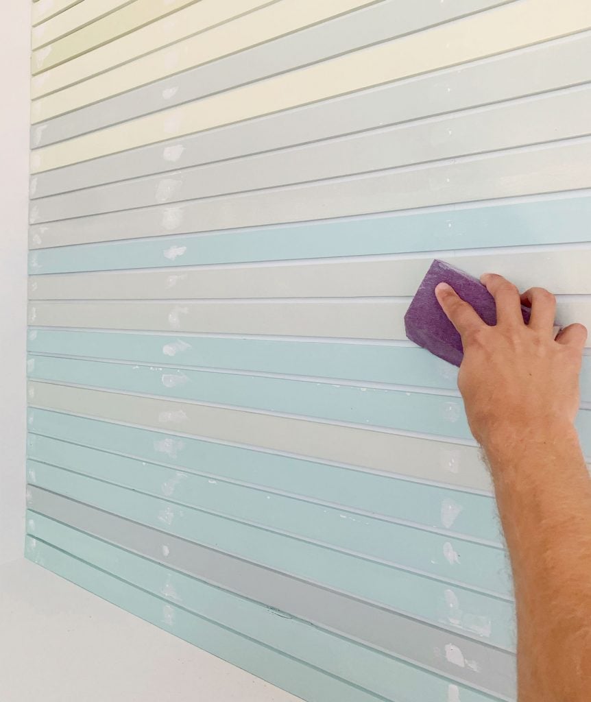 rainbwo-stripe-wall-sanding-spackle-862x1024-1 Hand Sanding Spackled Holes On Striped Wall Treatment