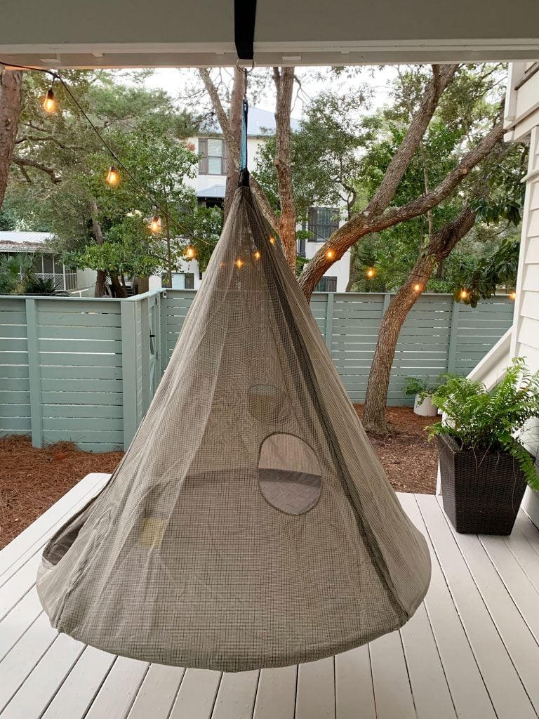 side-porch-from-kitchen-window-768x1024-1 Hanging cone shaped netted tent above painted porch floor
