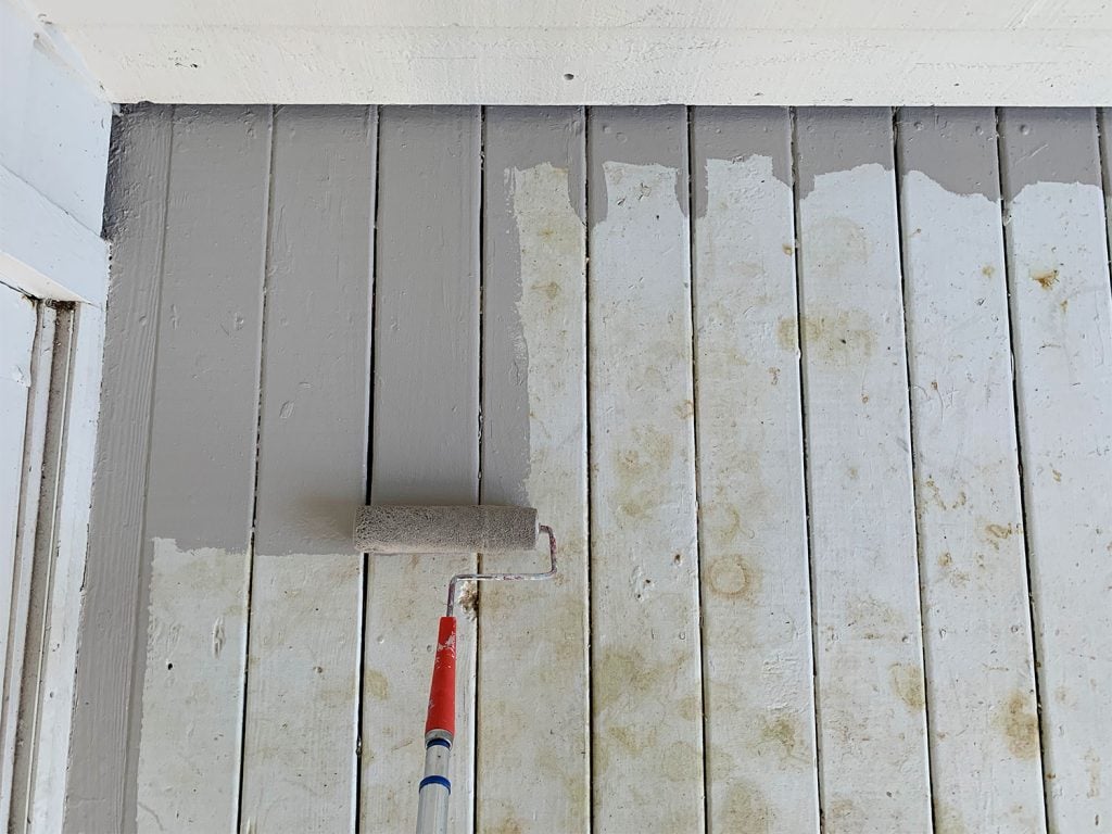 side-porch-painting-with-roller-1024x768-1 Roller applying gray porch paint to stained white porch floor