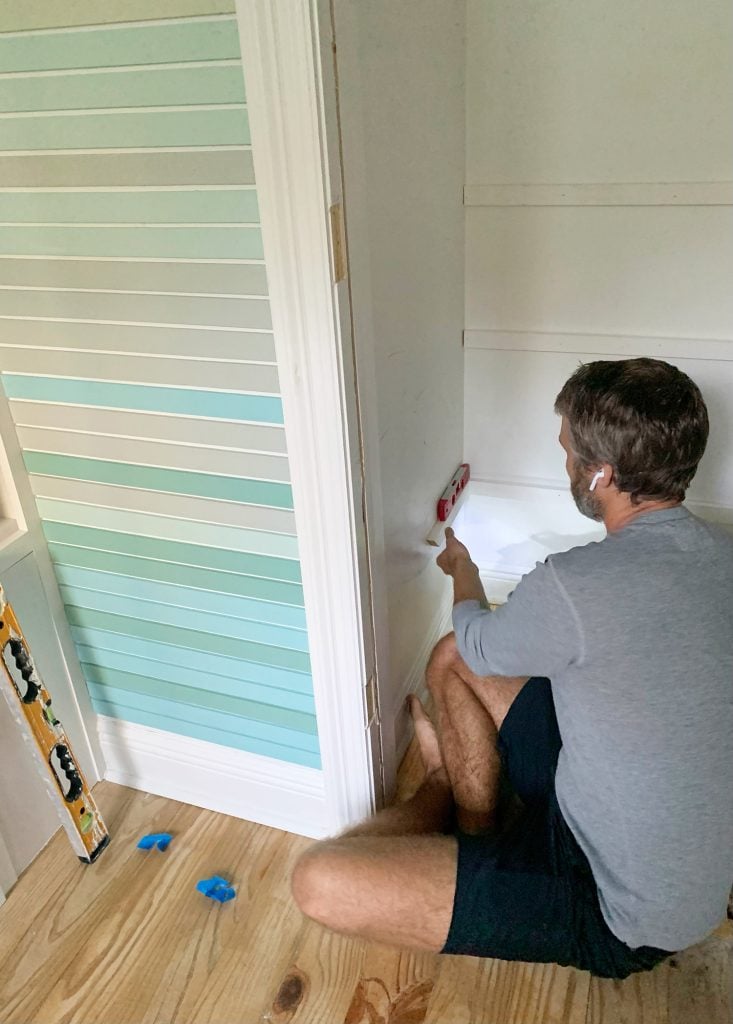 small-colorful-bedroom-diy-closet-shelves-in-progress1-733x1024-1 Adding Shelf Supports For DIY Closet Shelves With Level And Nail Gun