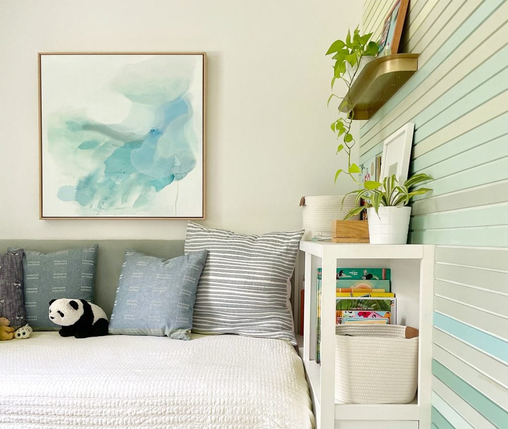 small-colorful-bedroom-horizontal-featured-image-1024x864-1 Small Kids Bedroom With Upholstered Headboard And Bookcase With Colorful Accent Wall