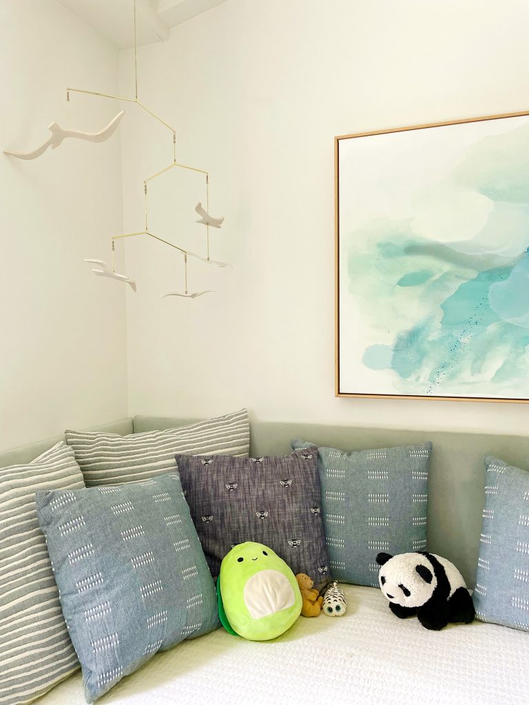 small-colorful-bedroom-upholstered-headboard-daybed-look-768x1024-1 Bed Against Wall With Upholstered Panels Behind It For Daybed Look