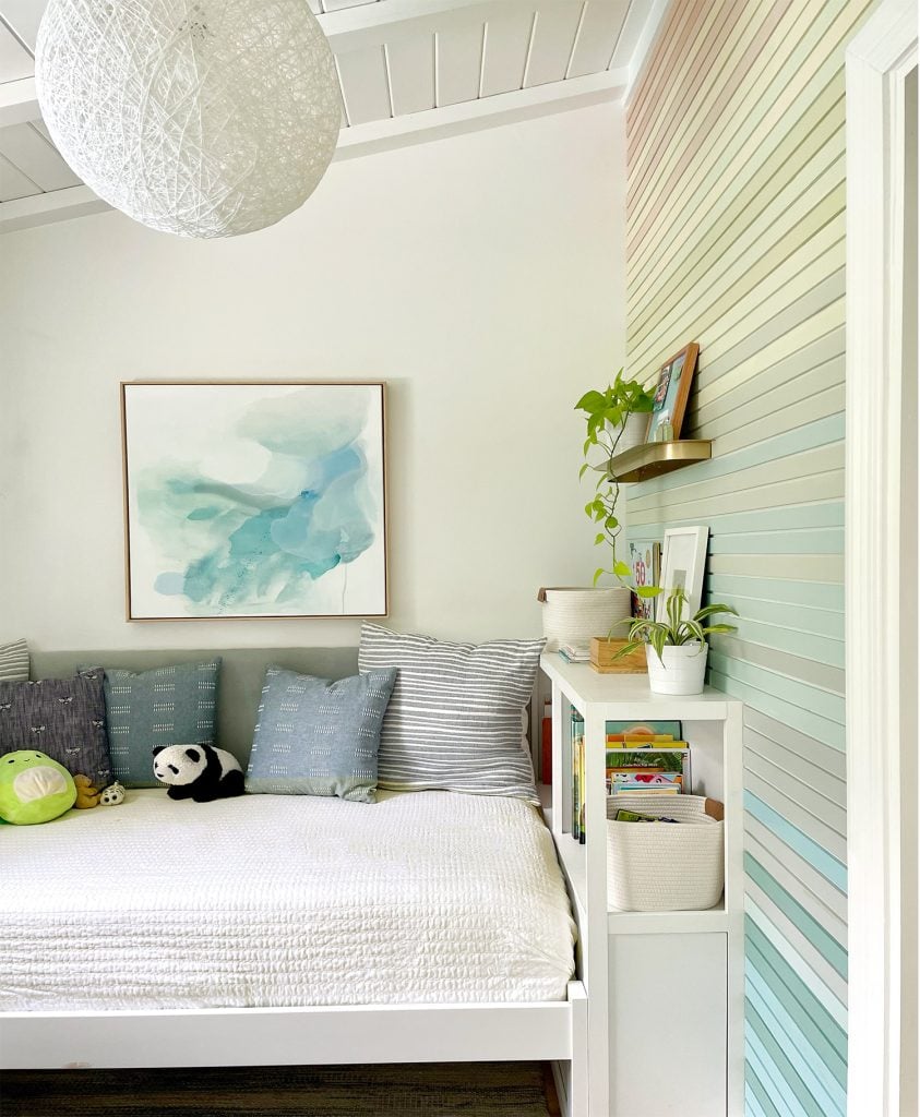small-colorful-bedroom-wood-treatment-accent-wall-843x1024-1 Small Kids Bedroom With Bed With Plush Headboard And Bookcase