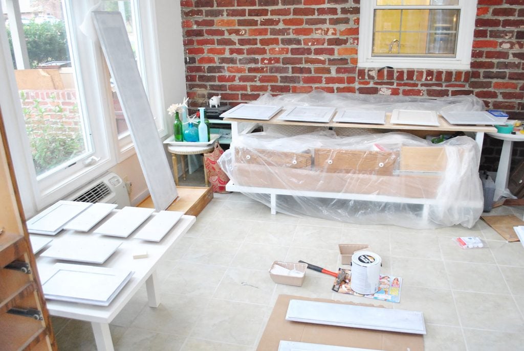step-5-cabinet-doors-laid-out-1024x687-1 Cabinet Doors Get Painted In Sunroom On Paint Risers